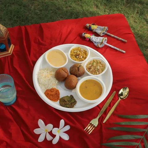 food placed in sugarcane bagasse plate & bowls